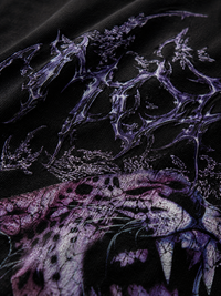 Genaura black oversized tee close-up, purple gothic panther graphic print detail