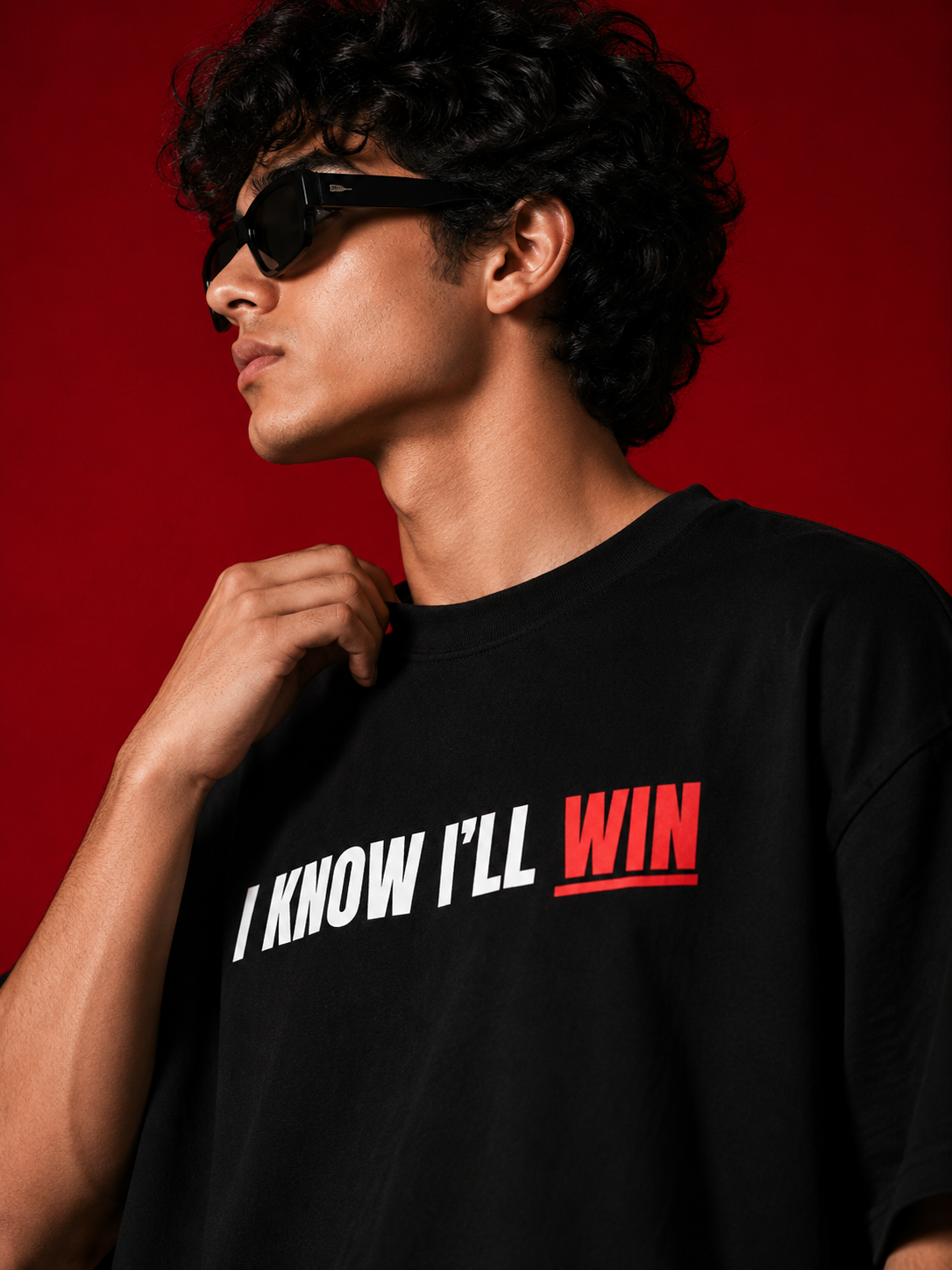 Model wearing Genaura I Know I'll Win oversized tee, red and white graphic