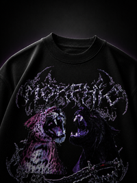 Genaura Morphic black oversized tee flat lay, gothic panther graphic streetwear closeup shot
