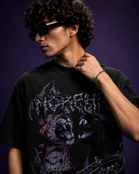 Model wearing Genaura Morphic oversized tee, gothic panther graphic streetwear