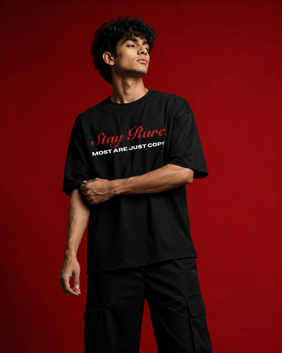 Genaura Stay Rare oversized tee full look, streetwear styling with cargo pants
